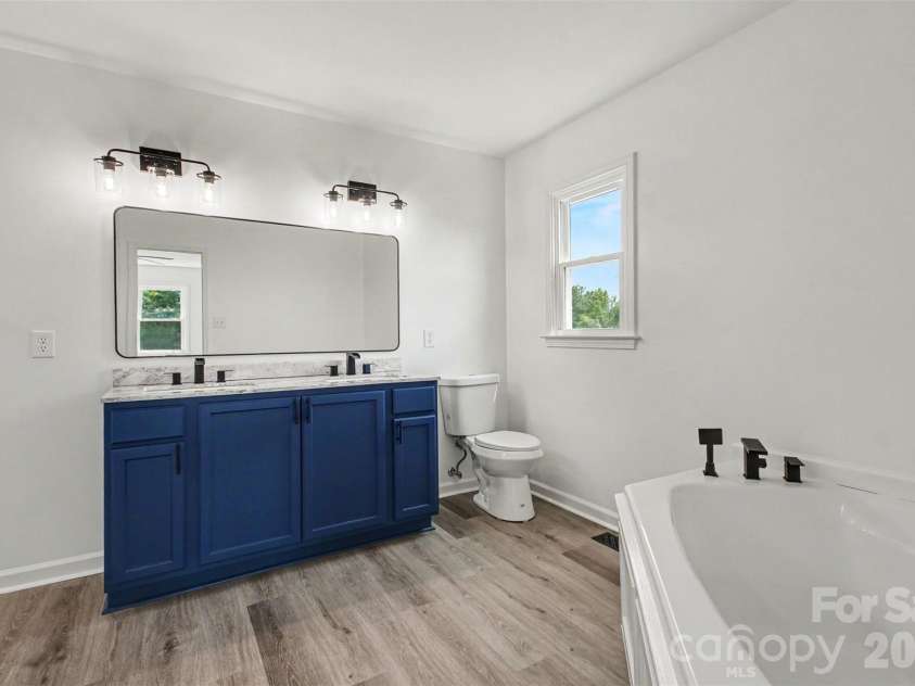 8379 Harvell Road, Stanfield, NC 28163.  MLS# CAR4410609, YatesRealty ID 44417. Primary bathroom