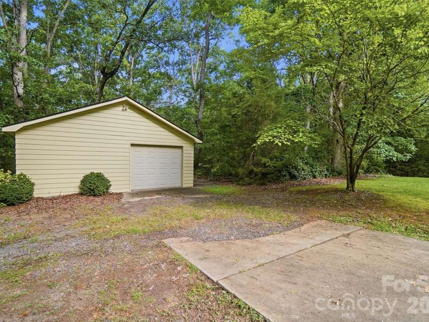 17047 Pond Road, Locust, NC 28097.  MLS# CAR4404743, YatesRealty ID 44419. Detached garage &   storage