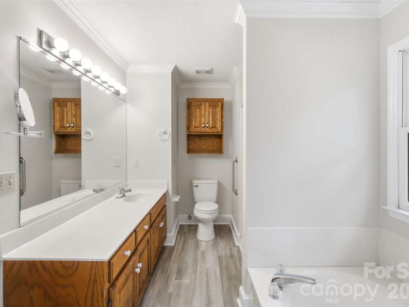 17047 Pond Road, Locust, NC 28097.  MLS# CAR4404743, YatesRealty ID 44419. Primary Bath