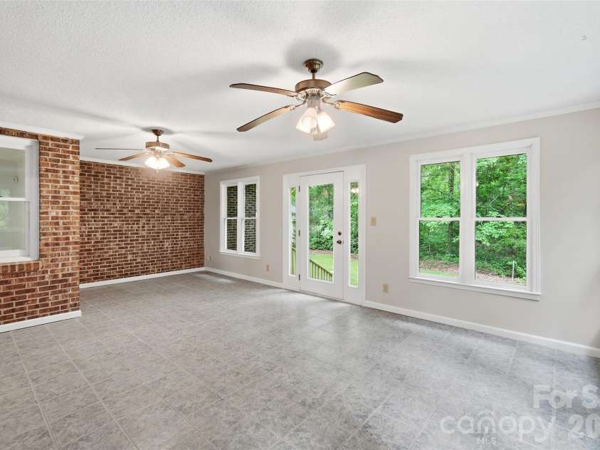 17047 Pond Road, Locust, NC 28097.  MLS# CAR4404743, YatesRealty ID 44419. Sunroom