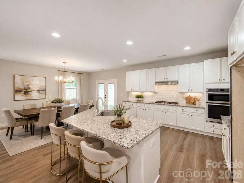 3021 Cresthill Drive, Charlotte, NC 28212.  MLS# CAR4413066, YatesRealty ID 44424. Virtually Staged (Dining Area)