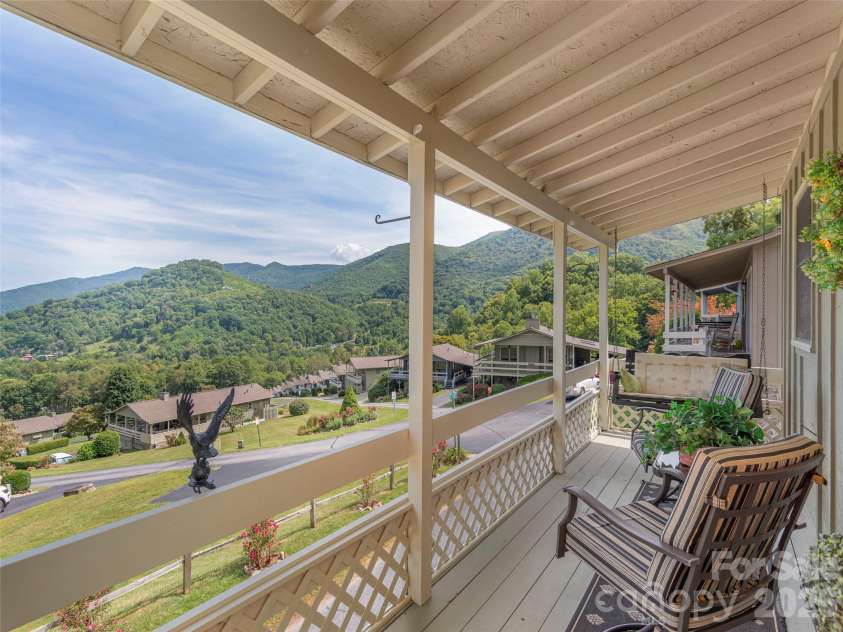 21 Flint Lane, Maggie Valley, NC 28751.  MLS# CAR4354413, YatesRealty ID 4443. Year Round Mountain Views from Upper Level Porch