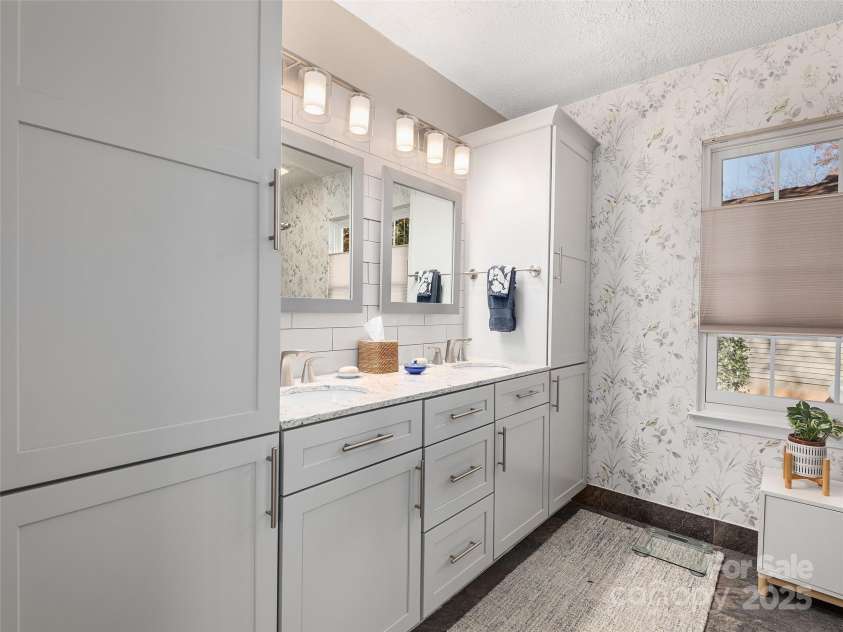 111 Wildwood Forest Lane, Mills River, NC 28759.  MLS# CAR4317593, YatesRealty ID 44435. Updated primary bathroom