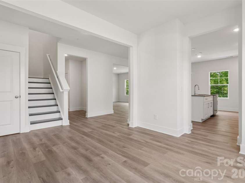 110 Morningside Loop, Troutman, NC 28166.  MLS# CAR4389466, YatesRealty ID 44443. Dining Room with view of kitchen and stairs