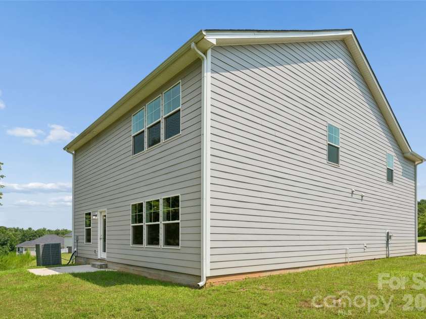 110 Morningside Loop, Troutman, NC 28166.  MLS# CAR4389466, YatesRealty ID 44443. Side of Home