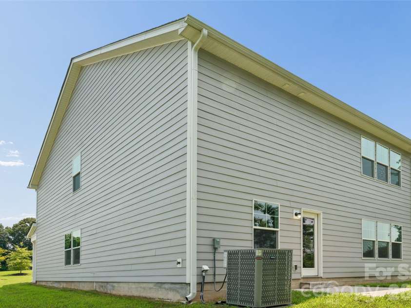 110 Morningside Loop, Troutman, NC 28166.  MLS# CAR4389466, YatesRealty ID 44443. Side of Home