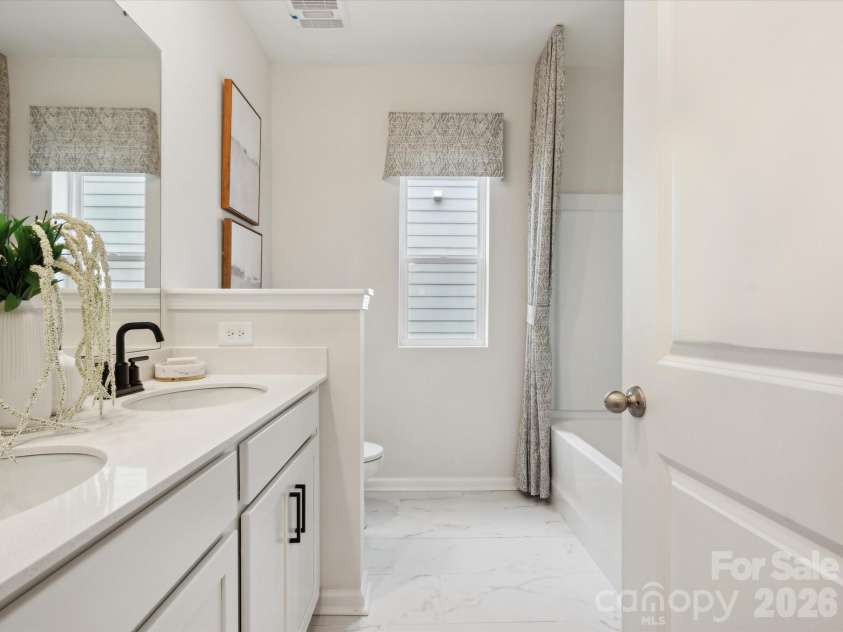 5066 Puddle Pond Road, Indian Trail, NC 28079.  MLS# CAR4414466, YatesRealty ID 44445. Representative photo-hall bath