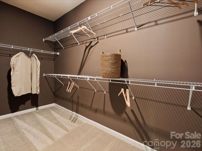 5066 Puddle Pond Road, Indian Trail, NC 28079.  MLS# CAR4414466, YatesRealty ID 44445. Representative photo Model Primary closet
