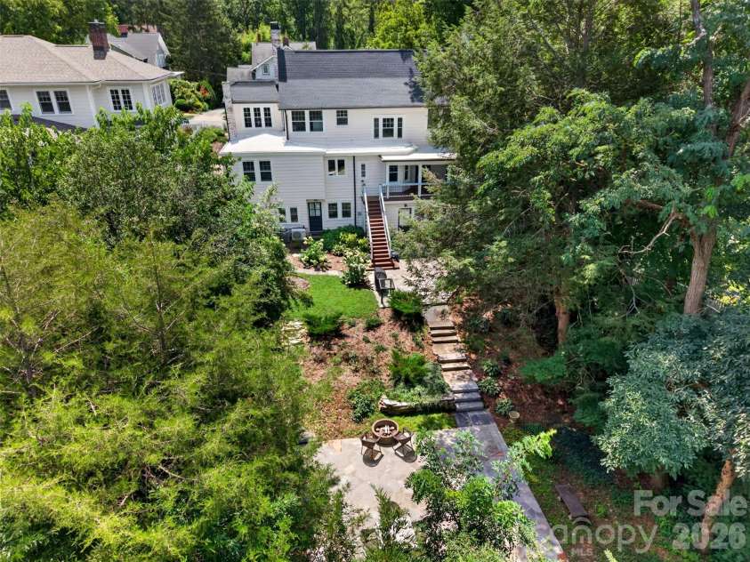 55 Edgemont Road, Asheville, NC 28801.  MLS# CAR4412693, YatesRealty ID 44449. Back yard view and house