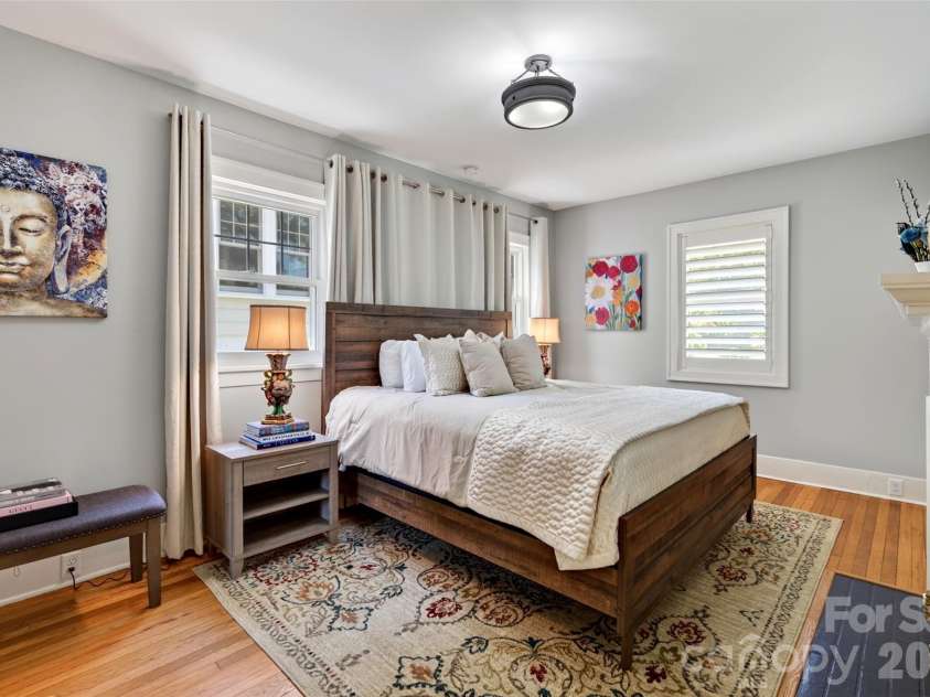 55 Edgemont Road, Asheville, NC 28801.  MLS# CAR4412693, YatesRealty ID 44449. Main level primary bedroom