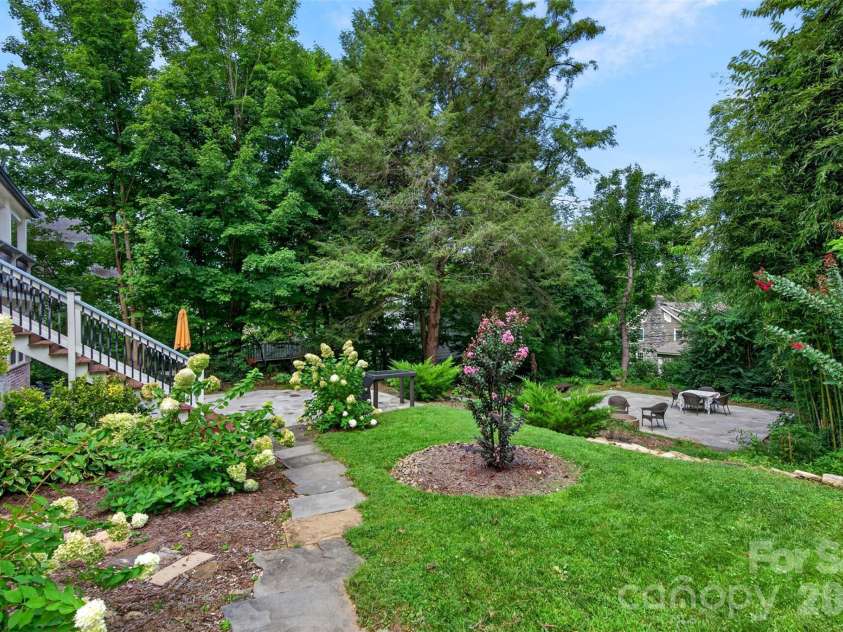 55 Edgemont Road, Asheville, NC 28801.  MLS# CAR4412693, YatesRealty ID 44449. Mid level of back terraced yard