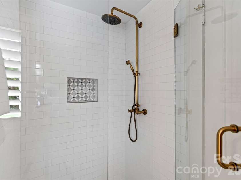 55 Edgemont Road, Asheville, NC 28801.  MLS# CAR4412693, YatesRealty ID 44449. Upper level primary bathroom shower