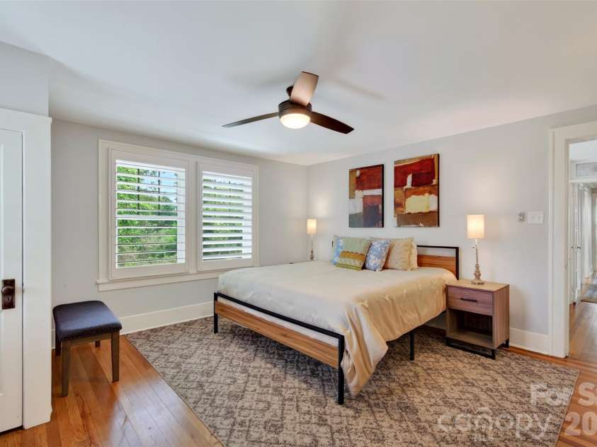 55 Edgemont Road, Asheville, NC 28801.  MLS# CAR4412693, YatesRealty ID 44449. Upper level primary bedroom