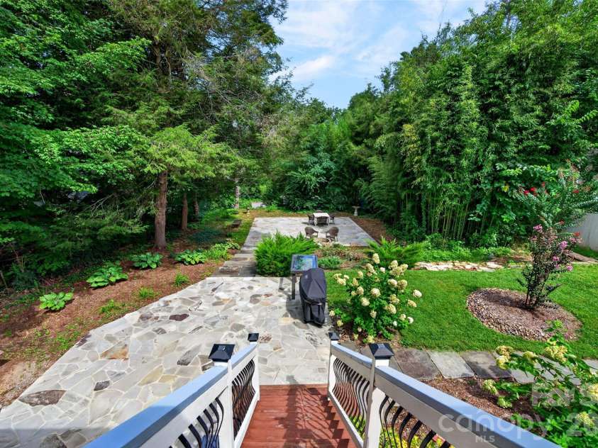 55 Edgemont Road, Asheville, NC 28801.  MLS# CAR4412693, YatesRealty ID 44449. View of terraced back yard from upper deck