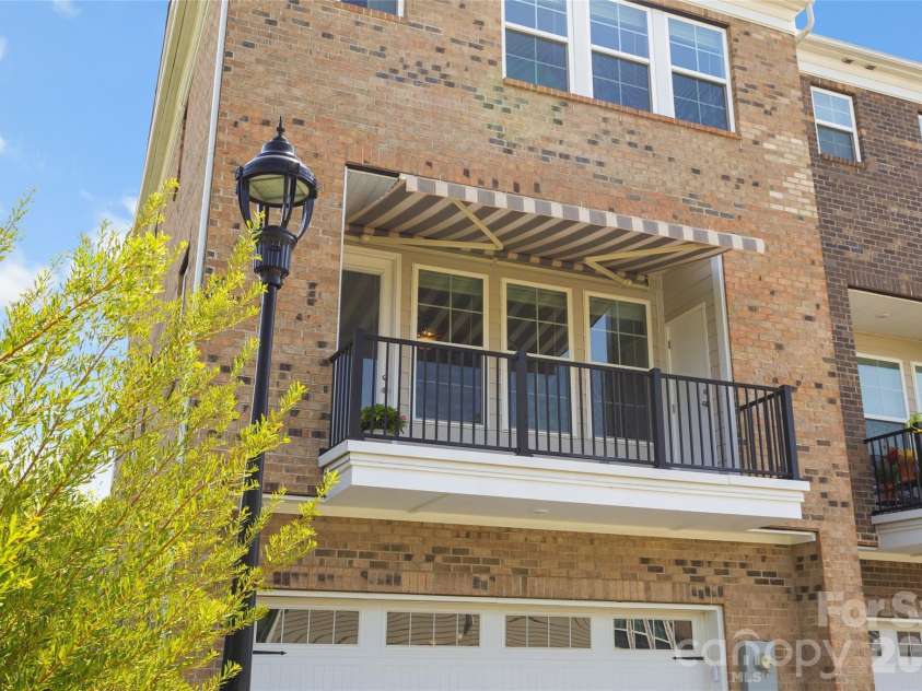 11645 Red Rust Lane, Charlotte, NC 28277.  MLS# CAR4409968, YatesRealty ID 44452. Deck with Striped Awning
