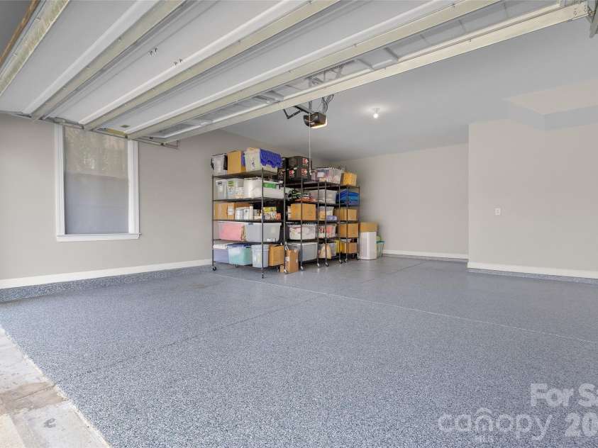 11645 Red Rust Lane, Charlotte, NC 28277.  MLS# CAR4409968, YatesRealty ID 44452. Epoxy Flooring, Immaculate painted garage