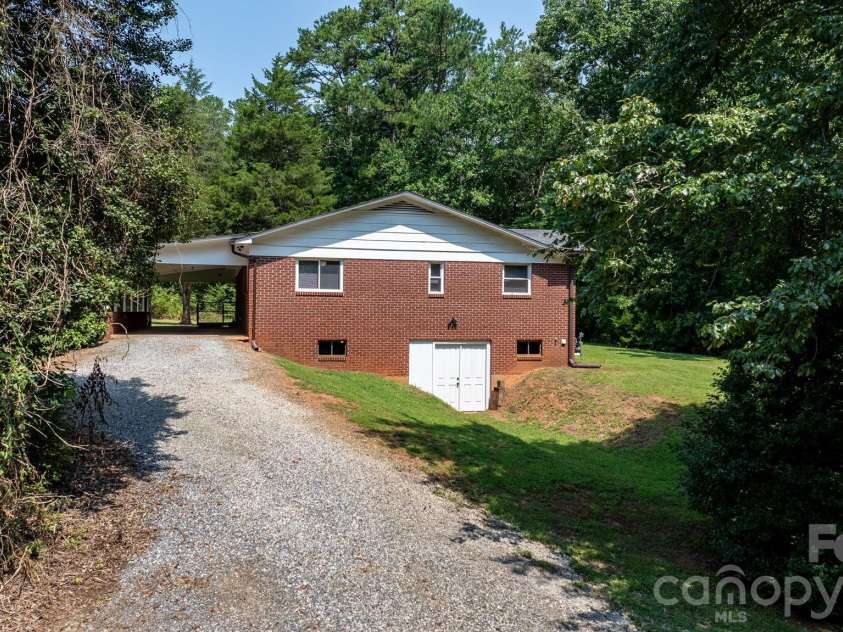 4370 Dynasty Lane, Hudson, NC 28638.  MLS# CAR4413469, YatesRealty ID 44456. Entry Driveway From Dynasty Ln