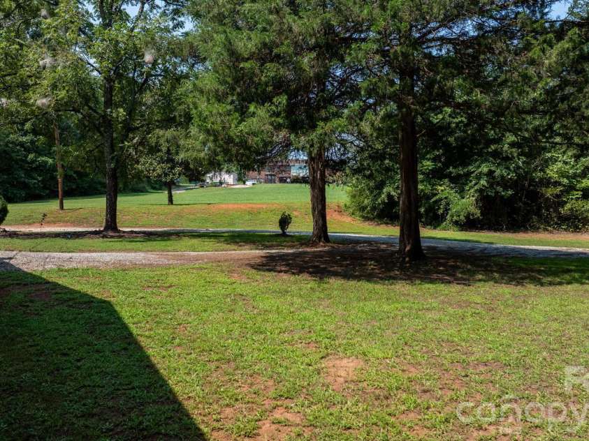4370 Dynasty Lane, Hudson, NC 28638.  MLS# CAR4413469, YatesRealty ID 44456. Front Yard and Circle Drive
