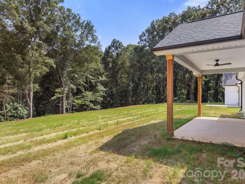 151 McCorkle Street, York, SC 29745.  MLS# CAR4414413, YatesRealty ID 44460. Backyard - Wooded