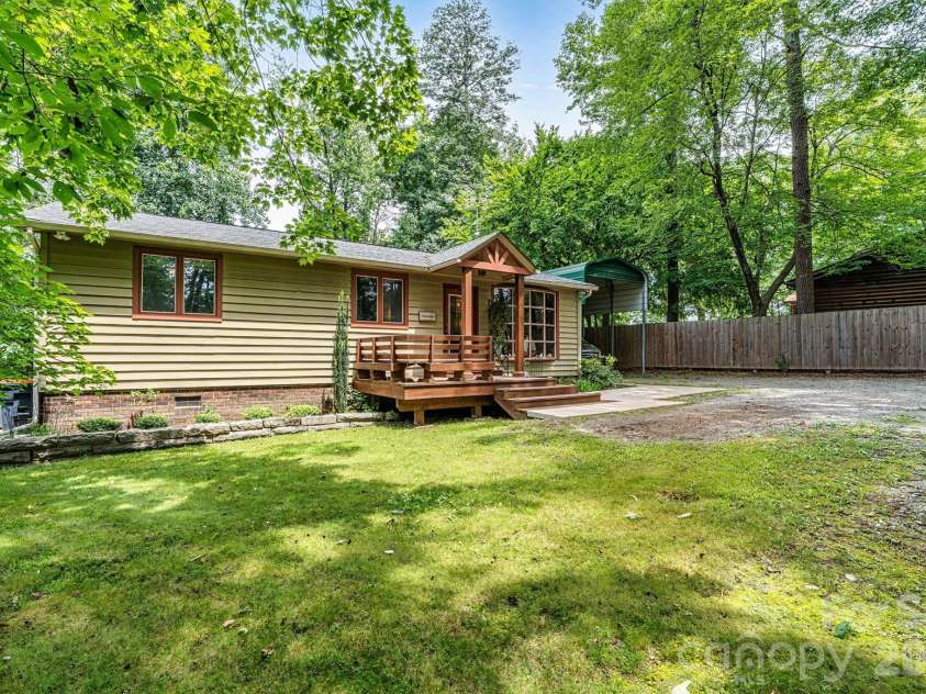 7697 Katherine Drive, Denver, NC 28037.  MLS# CAR4414395, YatesRealty ID 44462. Side front yard
