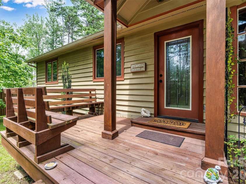 7697 Katherine Drive, Denver, NC 28037.  MLS# CAR4414395, YatesRealty ID 44462. Side front yard