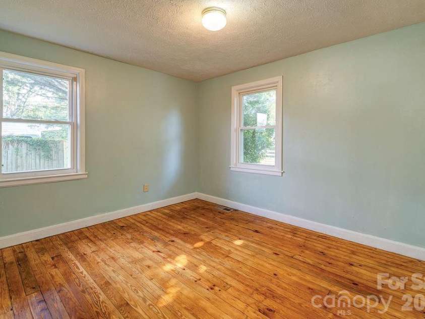 4 La Rue Street, Asheville, NC 28806.  MLS# CAR4414587, YatesRealty ID 44467. Front facing bedroom with ample sized closet