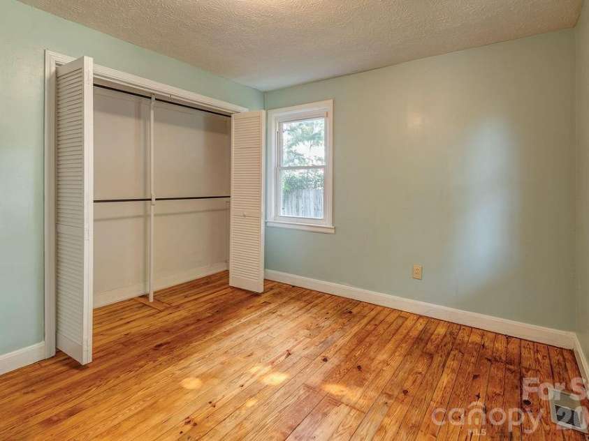 4 La Rue Street, Asheville, NC 28806.  MLS# CAR4414587, YatesRealty ID 44467. Front facing bedroom with ample sized closet