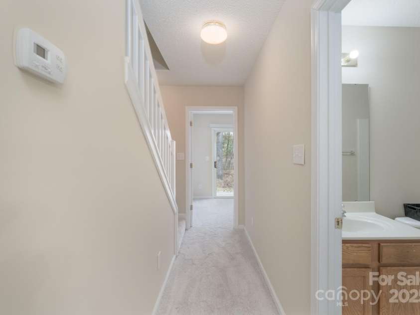331 Wilkes Place Drive, Fort Mill, SC 29715.  MLS# CAR4227425, YatesRealty ID 4447. Basement Hallway