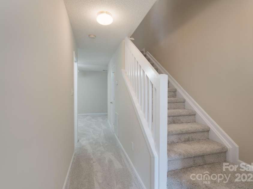 331 Wilkes Place Drive, Fort Mill, SC 29715.  MLS# CAR4227425, YatesRealty ID 4447. Basement Level Stairs