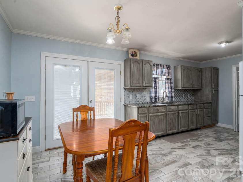1011 Lester Trail, Iron Station, NC 28080.  MLS# CAR4414828, YatesRealty ID 44471. Kitchen & Dining