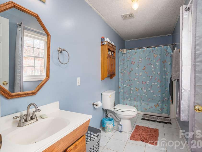 1011 Lester Trail, Iron Station, NC 28080.  MLS# CAR4414828, YatesRealty ID 44471. Primary Bath