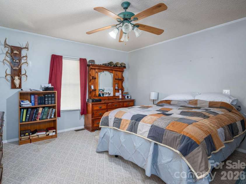 1011 Lester Trail, Iron Station, NC 28080.  MLS# CAR4414828, YatesRealty ID 44471. Primary Bedroom