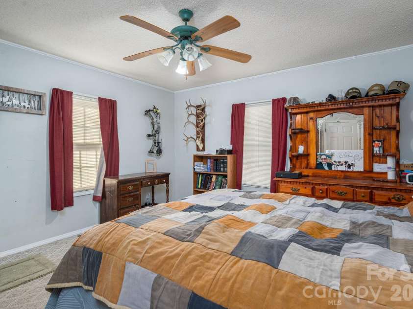 1011 Lester Trail, Iron Station, NC 28080.  MLS# CAR4414828, YatesRealty ID 44471. Primary Bedroom