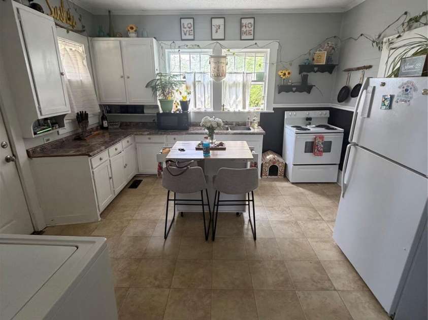 1235 Freeman Avenue, Albemarle, NC 28001.  MLS# CAR4414915, YatesRealty ID 44477. Occupied Side - Kitchen (1)