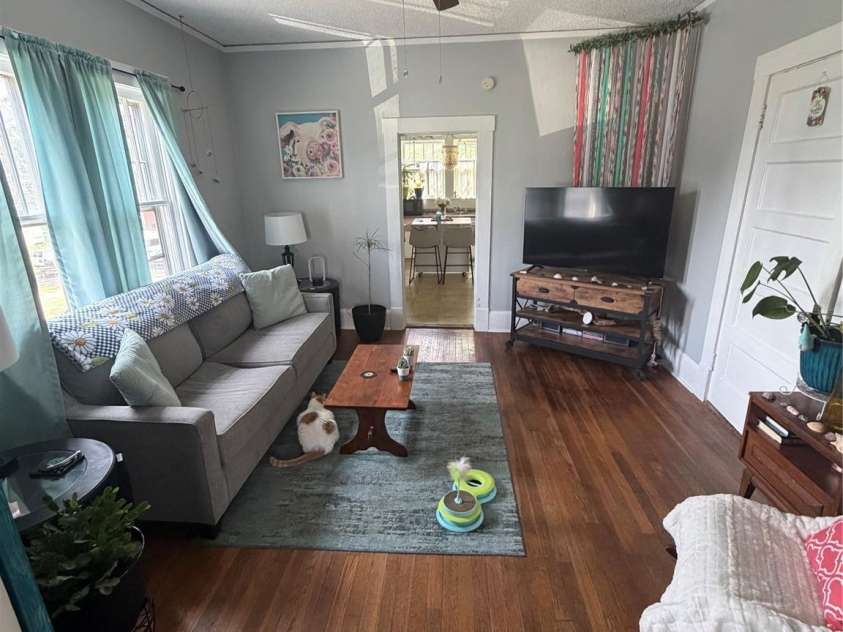 1235 Freeman Avenue, Albemarle, NC 28001.  MLS# CAR4414915, YatesRealty ID 44477. Occupied Side - Living Room