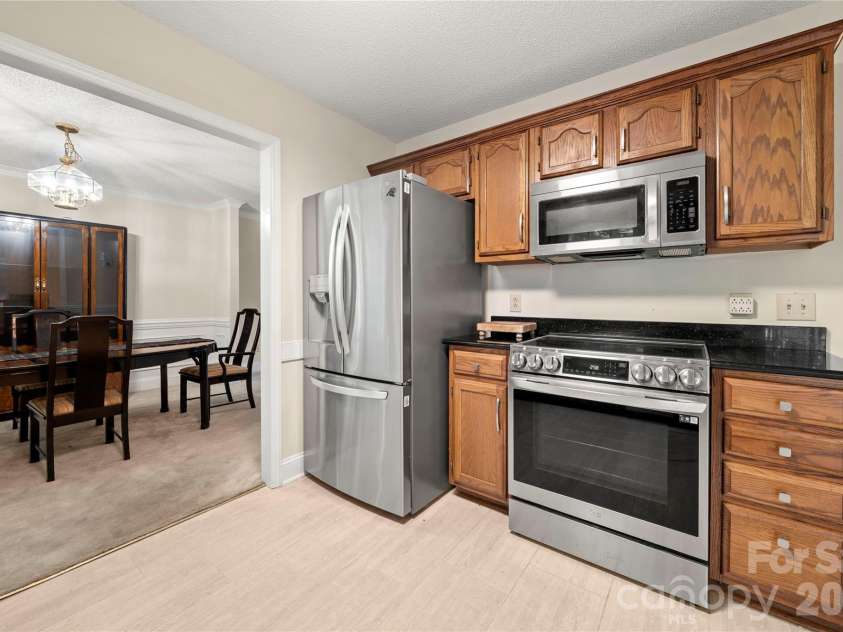 2708 Kirkholm Drive, Matthews, NC 28105.  MLS# CAR4413640, YatesRealty ID 44482. 