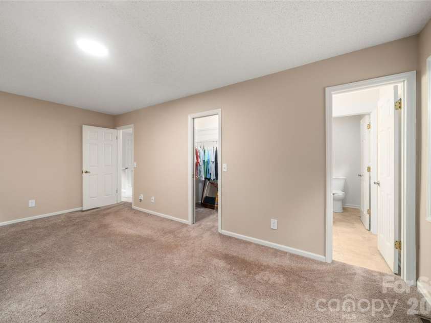 4 Hunters Lane, Hendersonville, NC 28791.  MLS# CAR4413010, YatesRealty ID 44499. Primary Bedroom