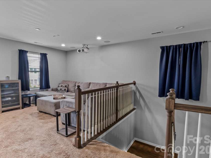 7513 Meridale Forest Drive, Charlotte, NC 28269.  MLS# CAR4414384, YatesRealty ID 44504. Lofft/Theater Area