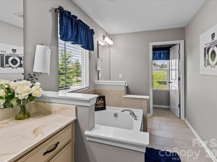 7513 Meridale Forest Drive, Charlotte, NC 28269.  MLS# CAR4414384, YatesRealty ID 44504. Primary Bedroom with Dual Sinks!