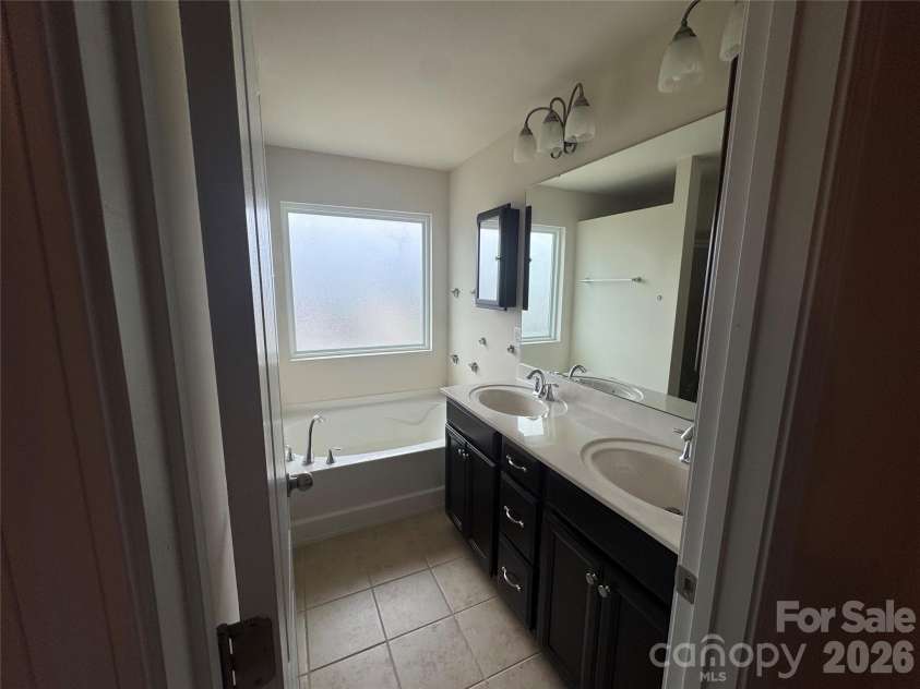 19010 Lake Breeze Drive, Cornelius, NC 28031.  MLS# CAR4414917, YatesRealty ID 44505. Primary Bathroom