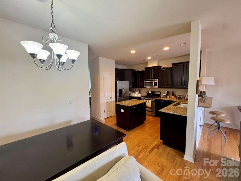 19010 Lake Breeze Drive, Cornelius, NC 28031.  MLS# CAR4414917, YatesRealty ID 44505. Second floor - Kitchen and Dining Room