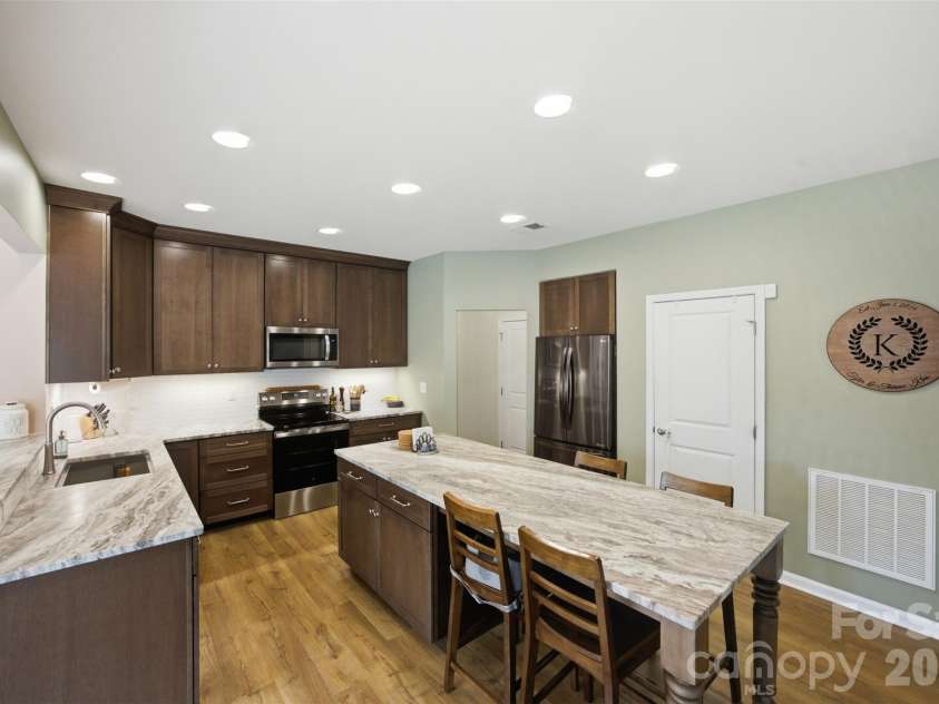7315 Mill Ruins Avenue, Concord, NC 28025.  MLS# CAR4414365, YatesRealty ID 44508. Recently renovated kitchen