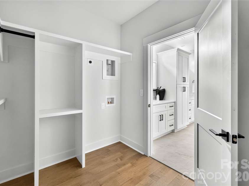 21017 Entrada Drive, Cornelius, NC 28031.  MLS# CAR4401505, YatesRealty ID 44524. Primary Closet w/Laundry