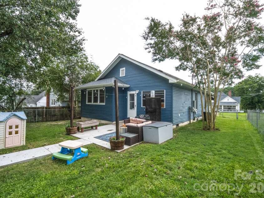 702 5th Street, Spencer, NC 28159.  MLS# CAR4413894, YatesRealty ID 44529. Fenced backyard