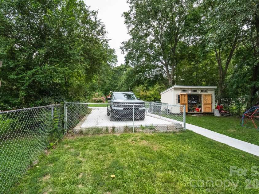 702 5th Street, Spencer, NC 28159.  MLS# CAR4413894, YatesRealty ID 44529. Fenced backyard and parking