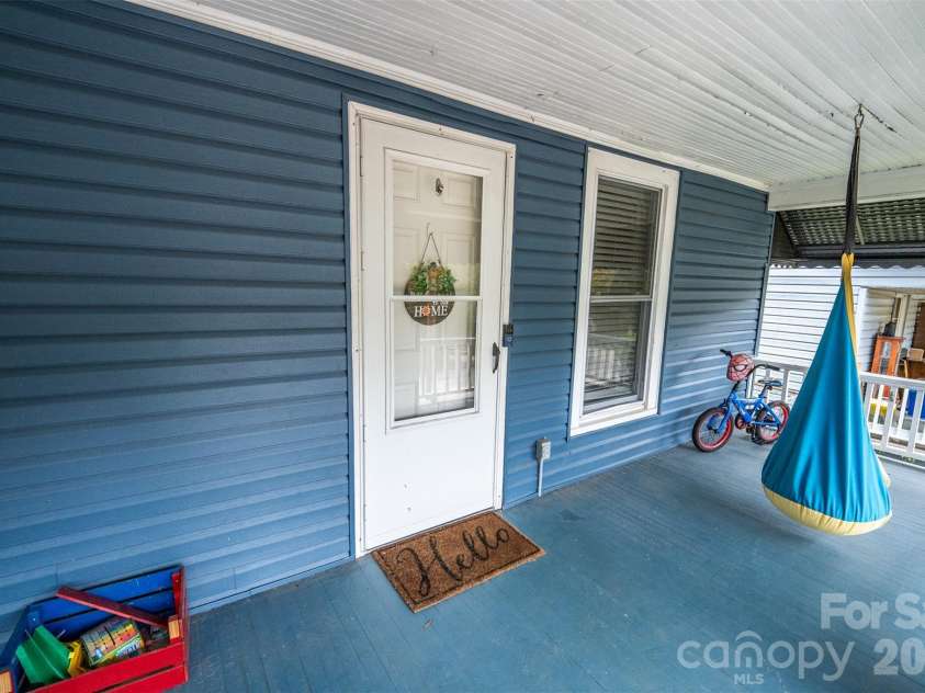 702 5th Street, Spencer, NC 28159.  MLS# CAR4413894, YatesRealty ID 44529. Front sitting porch
