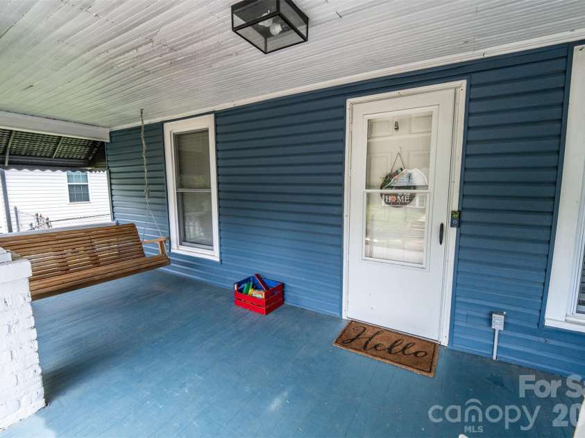 702 5th Street, Spencer, NC 28159.  MLS# CAR4413894, YatesRealty ID 44529. Front sitting porch