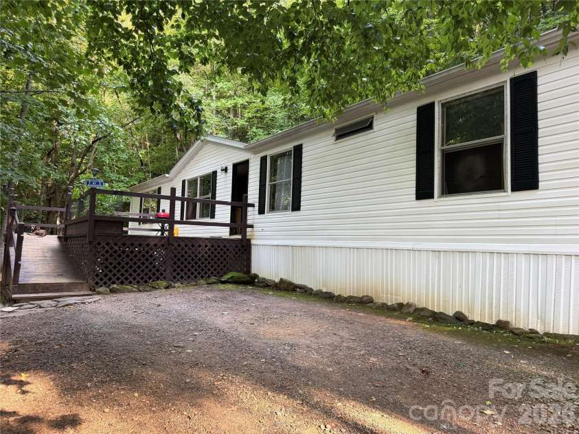 261 Warren Creek Road, Candler, NC 28715.  MLS# CAR4413970, YatesRealty ID 44536. 