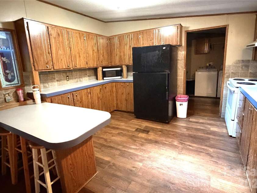 261 Warren Creek Road, Candler, NC 28715.  MLS# CAR4413970, YatesRealty ID 44536. 