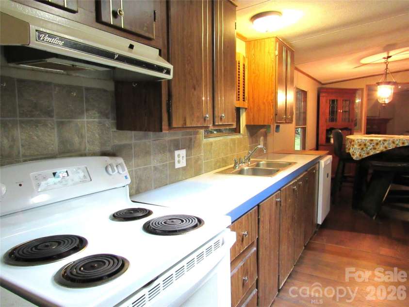 261 Warren Creek Road, Candler, NC 28715.  MLS# CAR4413970, YatesRealty ID 44536. 